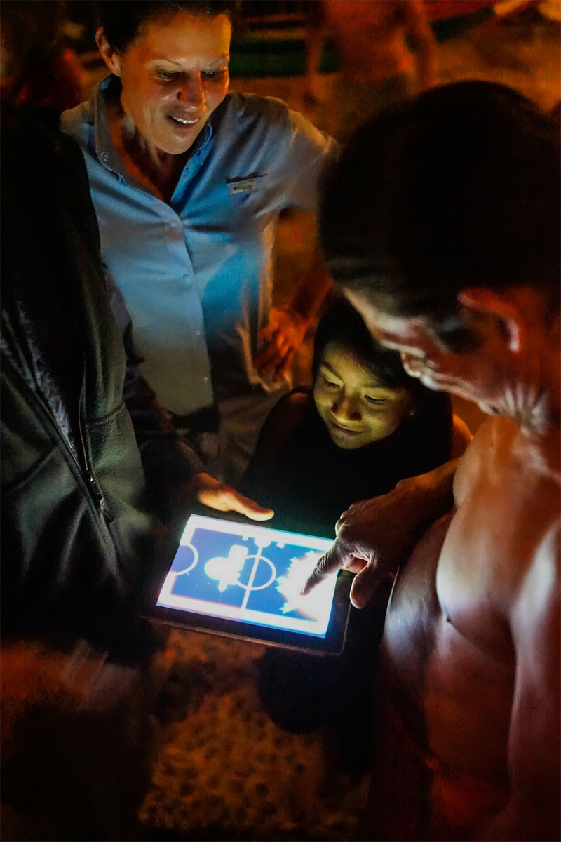 Illustration for article titled BioWare Founder Plays Video Games, In The Jungle, With Amazon Tribe